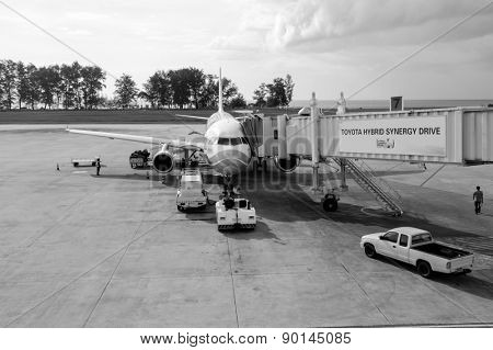 PHUKET, THAILAND - OCTOBER 25, 2011: Bangkok Air jet airplane docked in Phuket International Airport on. Bangkok Airways Public Company Limited is a regional airline based in Vibhavadi Rangsit Road