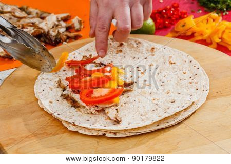 chef making tortilla