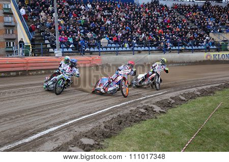 Speedway riders on the track
