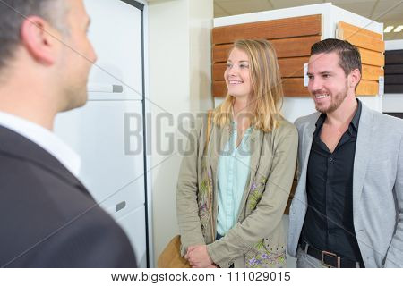 Couple loooking around a materials showroom