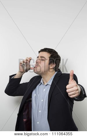 happy businessman drinking water