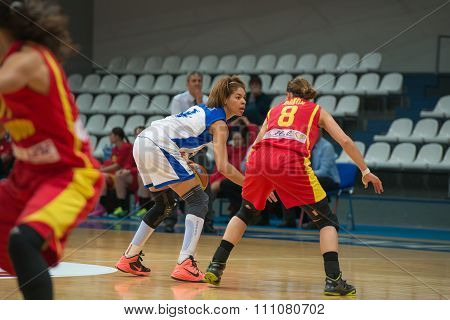 MOSCOW -- DECEMBER 4, 2014: Katerina Keyru (4) atack on the International Europe bascketball league match Dynamo Moscow vs Maccabi Ashdod Israel in sport palace Krilatskoe, Moscow, Russia. Dynamo loss 59:67