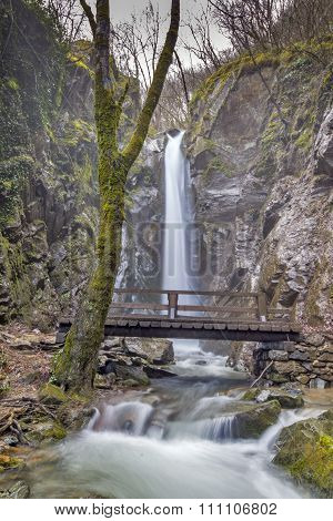 Kameshnishki Waterfall in deep forest, Belasitsa Mountain
