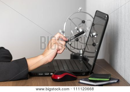 Business woman pointing at laptop screen to re-check information and data. conceptual of people at working place.