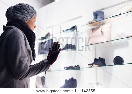 Woman window shopping.