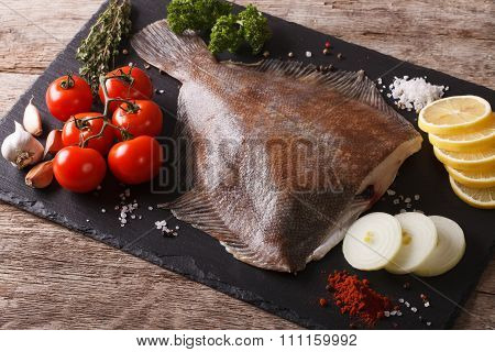 Fresh Raw Plaice With Ingredients On A Slate Board. Horizontal