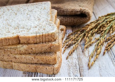 Whole Wheat Bread On Wooden Table Background