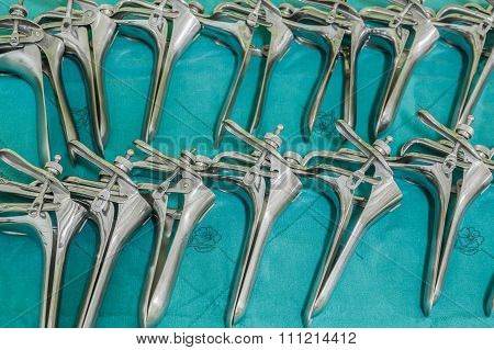 Group Of Speculum On Green Close Up