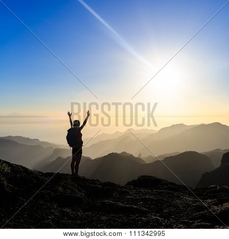 Woman Hiking Success Silhouette In Mountains Sunset
