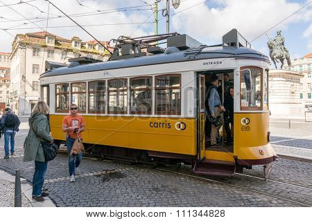 Lisbon, Portugal March 24, 2013: Historic yellow tram in front of the Lisbon 