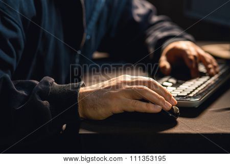 Hacker Typing On Pc Keyboard