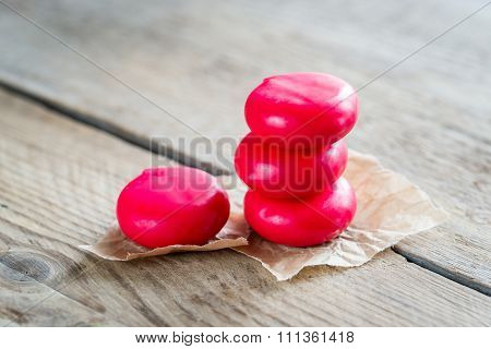 Stack Of Mini Cheese On The Wooden Table