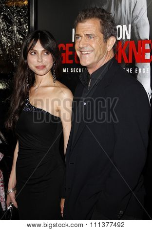 HOLLYWOOD, CALIFORNIA - Tuesday January 26, 2010. Mel Gibson and Oksana Grigorieva at the Los Angeles premiere of 