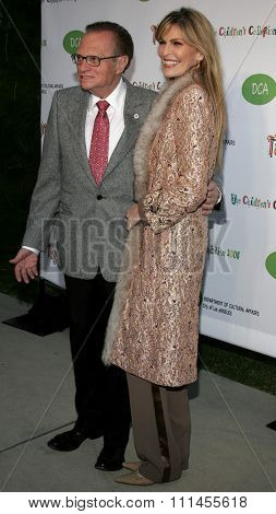 April 22, 2006. Larry King and Shawn Southwick-King attend the opening of 