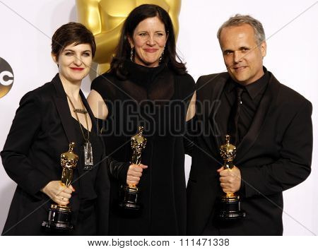 Dirk Wilutzky, Laura Poitras and Mathilde Bonnefoy at the 87th Annual Academy Awards Press Room held at the Loews Hollywood Hotel in Hollywood on February 22, 2015.