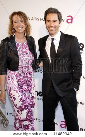 Eric McCormack and Janet Holden at the 21st Annual Elton John AIDS Foundation Academy Awards Viewing Party held at the Pacific Design Center in West Hollywood on February 24, 2013.
