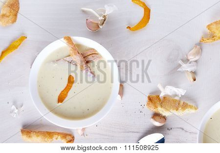 Garlic cream soup in white plate