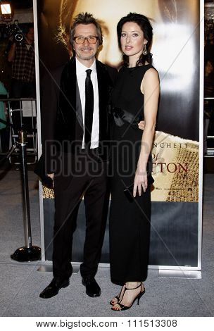 Gary Oldman and Alexandra Edenborough at the Los Angeles premiere of 'The Curious Case Of Benjamin Button' held at the Mann's Village Theater  in Westwood on December 8, 2008. 