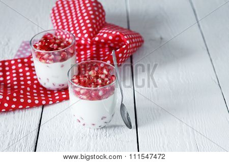 Delicious Dessert Pannacotta With Fresh Pomegranate Seeds In A G