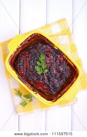 terrine meat baked in yellow uniform with spices