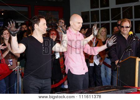 HOLLYWOOD, CALIFORNIA. April 23, 2008. Billy Corgan and Jimmy Chamberlin attend the Hollywood's RockWalk inducts The Smashing Pumpkins held at the Guitar Center in Hollywood, California United States.