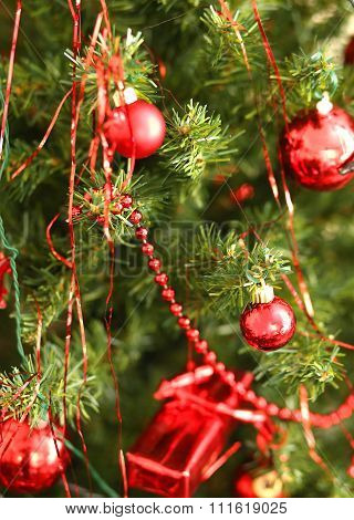 Red Glass Balls Decorate A Christmas Tree