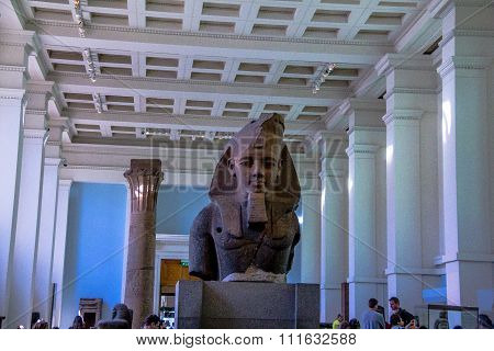 Visitors In Egypt Hall Of The British Museum. The Museum Contain Almost 71,000 Books, Manuscripts, D