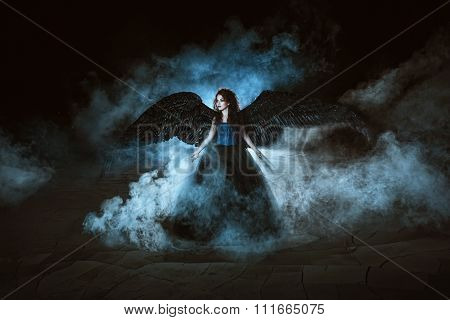 Angel with black wings