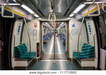 SINGAPORE - NOVEMBER 08, 2015: interior of MRT train. The Mass Rapid Transit, or MRT, is a rapid transit system forming the major component of the railway system in Singapore