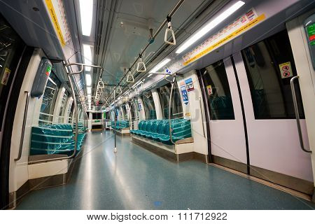 SINGAPORE - NOVEMBER 08, 2015: interior of MRT train. The Mass Rapid Transit, or MRT, is a rapid transit system forming the major component of the railway system in Singapore