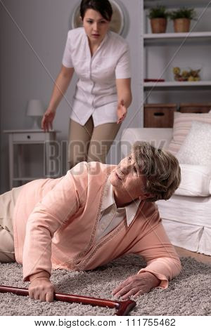 Carer Helping Injured Elderly Woman