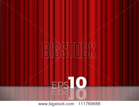 Red Closed Curtain With Light Spots In A Theater