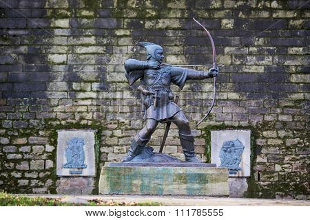 NOTTINGHAM, UK - DECEMBER 04: Statue of Robin Hood outside Nottingham castle. The statue, created by James Woodford, was unveiled in 1952. December 04, 2015 in Nottingham.