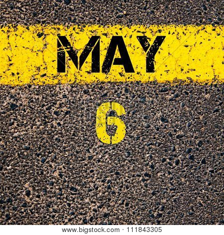 6 May Calendar Day Over Road Marking Yellow Paint Line
