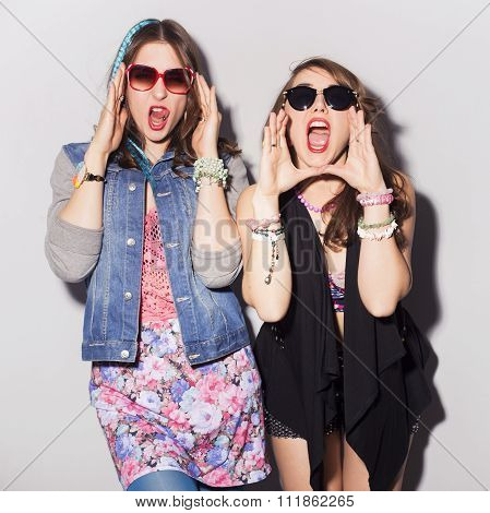 Two Beautiful Brunette Women (girls) Teenagers Spend Time Together Having Fun, Make Funny Faces. Ret