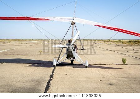 Hang-gliding, Standing At Dawn On The Runway