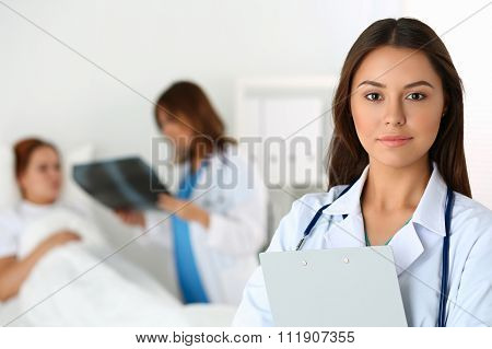 Beautiful Female Medicine Doctor Looking In Camera