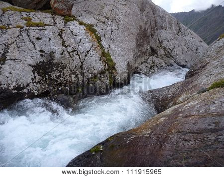 Outlet Of The Alla Kol Lake In Kyrgyzstan