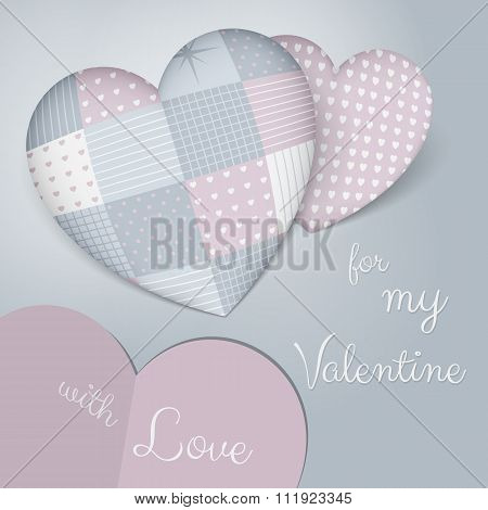 3D pillows in shape of a heart with patchwork. Sensual blue and rose shades. Valentine's day.
