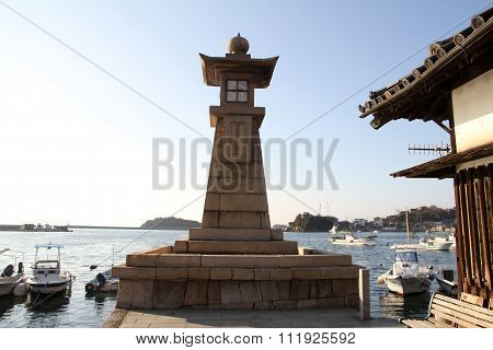 Old stone lantern in Tomonoura Hiroshima Japan