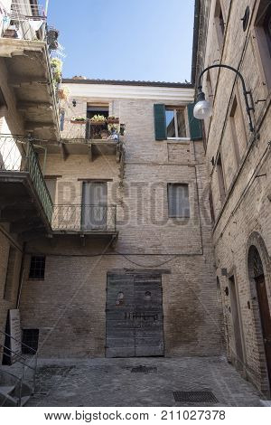 Appignano (Ancona Marches Italy) buildings of the historic village: a typical street