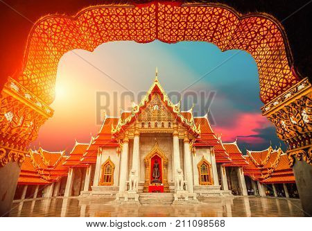 The Marble Temple Wat Benchamabopit Dusitvanaram with sunset sky in Bangkok Thailand.