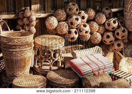 Different rattan souvenirs such as sepak takraw balls baskets and furniture Bagan Myanmar