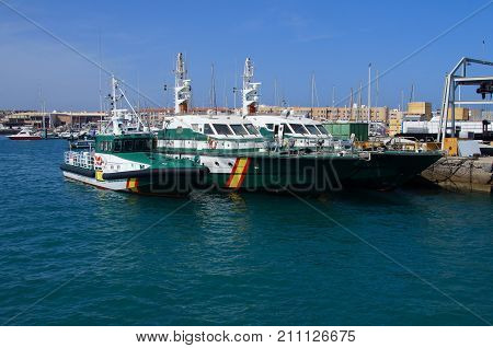 Corralejo, Fuerteventura, Canary Islands, Spain - October 24, 2017: Spanish Guardia Civil nautical patrol vessels in the harbor of Corralejo.