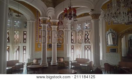 BENGALURU INDIA - FEBRUARY 20 2017: Interior decoration of famous Bangalore Palace. It was private residence of the royal Wodeyar family. It is filled with rare collection of art and paraphernalia from a bygone era.