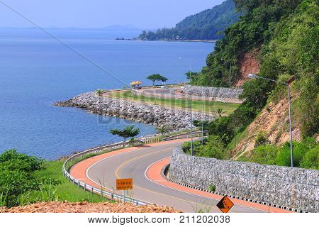 Beautiful curve road side the sea and mountain - Noen-nangphaya view point
