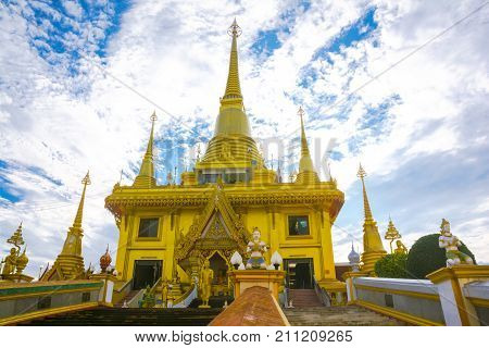 Beautiful of the golden pagoda at Wat KeereeWong NakhonSawan Thailand.