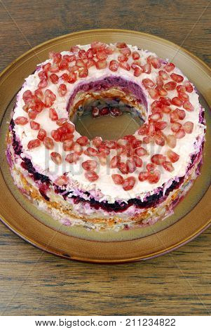 traditional salad herring dressed layered with vegetables- Selyodka pod shuboy