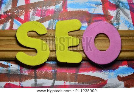 the word seo on a  abstract colorful background