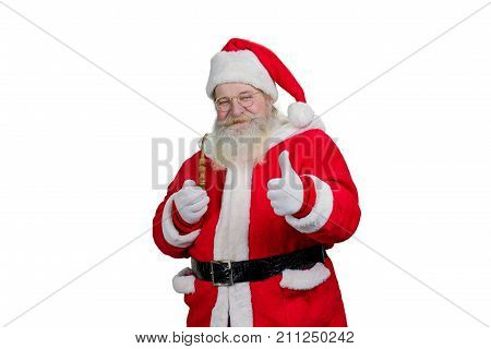 Santa with pipe giving thumb up. Authentic Santa Claus with real beard and giving thumb up, isolated on white background. Portrait of Santa with ok geture.